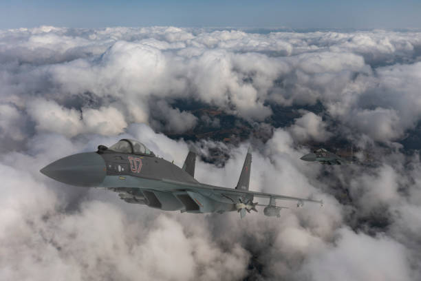 istock Russian Jet fighters flying over clouds. 2173535044