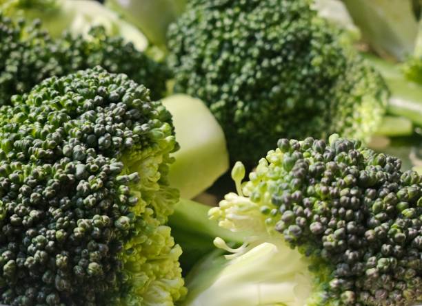 istock Close-up green broccolis florets texture 2173537435