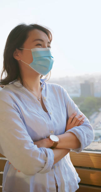 istock mask woman prevent air pollution 2173538504