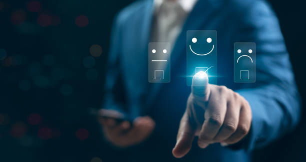 istock Customer service and Satisfaction concept, Businessman touching the virtual screen on the happy Smiley face icon to give satisfaction in service. rating very impressed. 2173544478