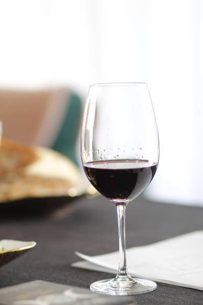 istock glass of red on the dining table 2173555651
