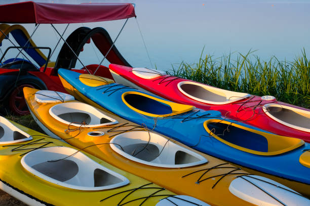 istock Colorful kayaks or canoes on a water background. 2173556522