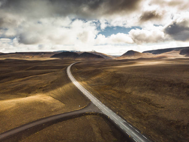 istock winding road in iceland aerial view 2173563288