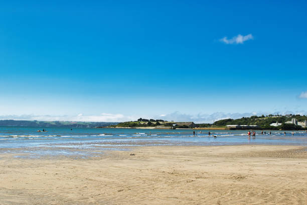 istock Serene Beach Scene with Clear Blue Sky in Cornwall, UK 2173568527