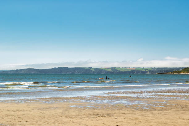 istock Serene Beach with Gentle Waves and Clear Sky in Cornwall, UK 2173568637