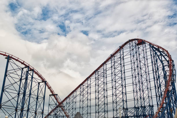 istock Exciting Roller Coaster Against Cloudy Sky in Blackpool, UK 2173571023