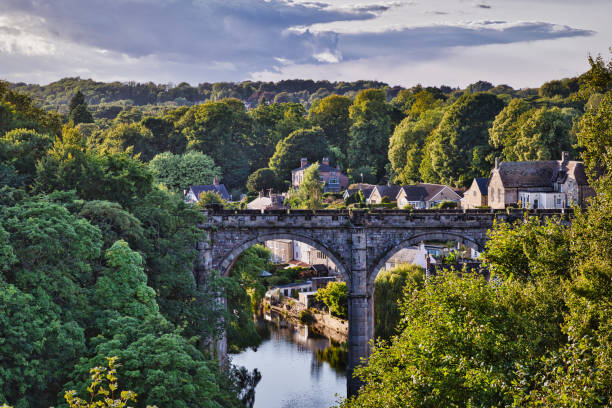 istock Scenic Stone Bridge Over River Surrounded by Greenery in Knaresborough, North Yorkshire 2173576137