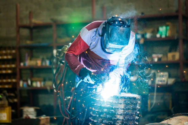 Welder working in the factory
