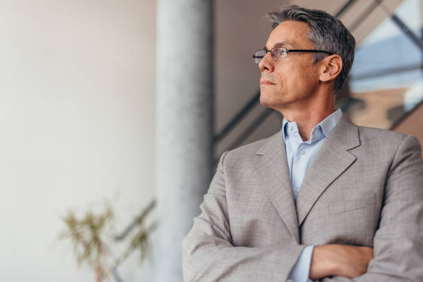 istock Confident business man in a modern office environment. 2173588010
