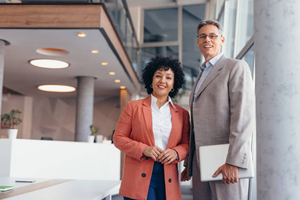 istock Confident business team posing in modern office environment 2173588081