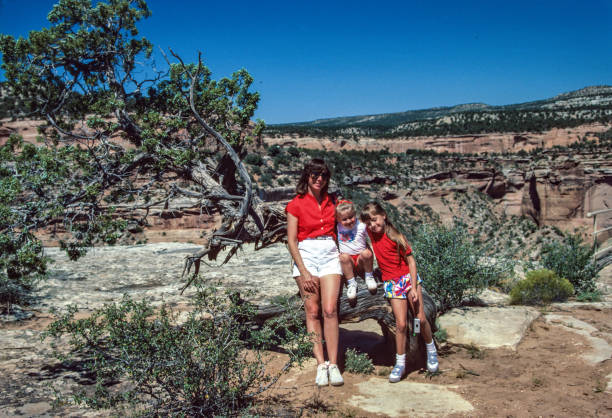 Colorado NM - Girls and Mother Pause at Overlook - 1986 stock photo