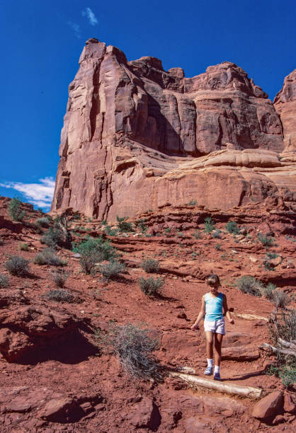 istock Arches NP - Young Hiker on Trail - 1986 2173590628