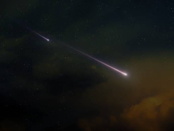istock Two meteor trails in the evening sky. 2173594396