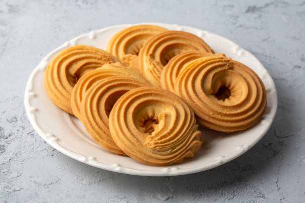 istock Sweet and tasty round butter cookies. Round ring shaped German spritz biscuits 2173601863
