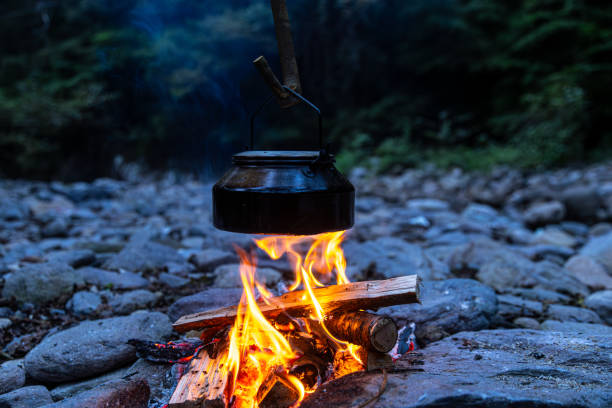 istock The sun sets and a bonfire is fired on the riverside 2173634904