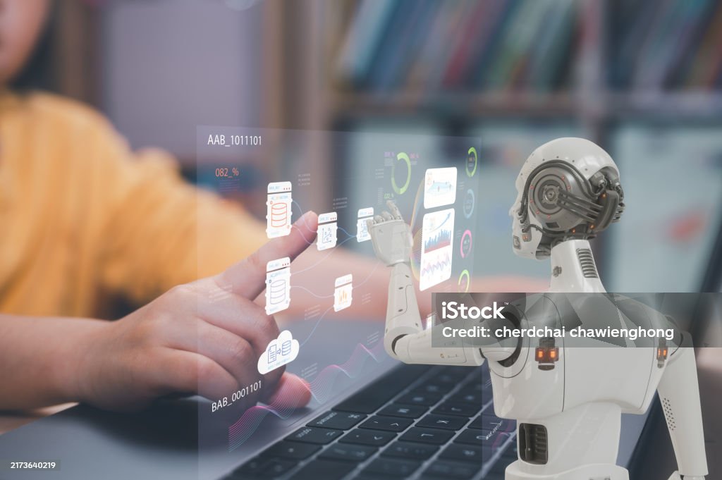 learning concept children using computer in classroom working with robot analysing or creating program and data chart, kid skill development and activity Artificial Intelligence Stock Photo