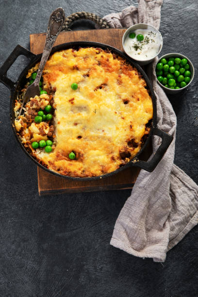 istock Shepherds Pie - ground meat with vegetables, topped with mashed potatoes, and cheese. Baked. 2173645612