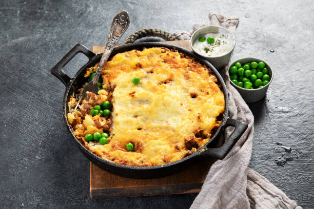 istock Shepherds Pie - ground meat with vegetables, topped with mashed potatoes, and cheese. Baked. 2173645629
