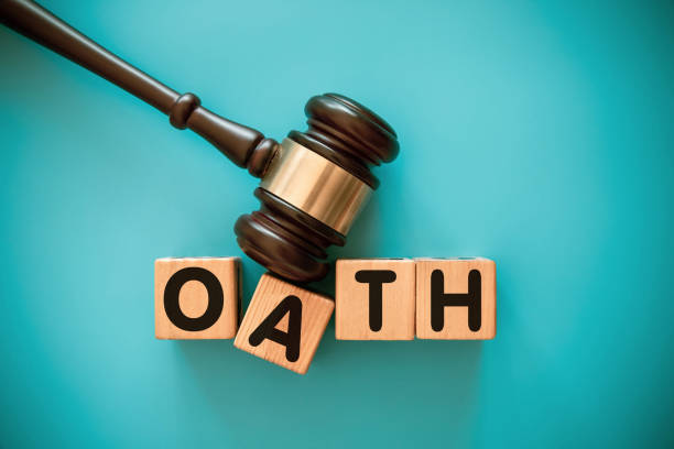 istock Gavel and toy block with OATH 2173645749