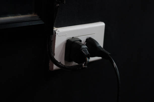 electricity plug device and cable tv socket on wall at home. power supply, Energy Saving, power, electrical and lifestyle concepts