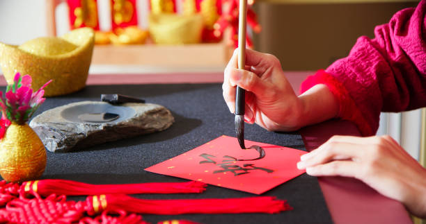 istock Writing spring festival couplet 2173650479