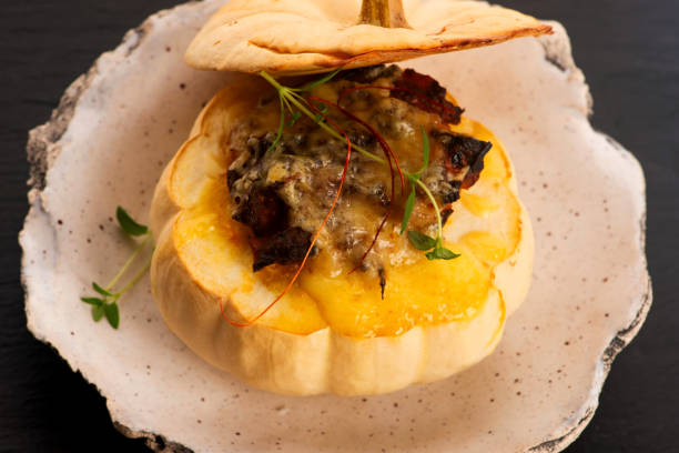 istock Delicious autumn recipe for stuffed pumpkin 2173651415