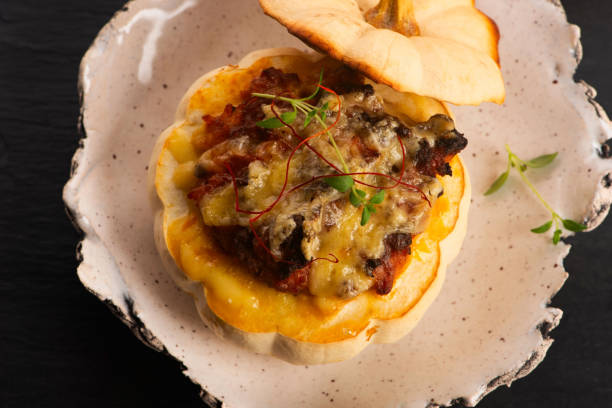 istock Delicious autumn recipe for stuffed pumpkin 2173651421