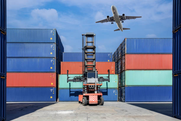 istock Stack of containers in a harbor. Shipping containers stacked on cargo ship. Background of Stack of Containers at a Port. 2173652427