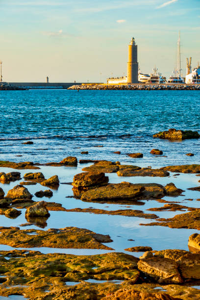 istock Fanale dei Pisani Lighthouse and Rocky Coastline 2173654121