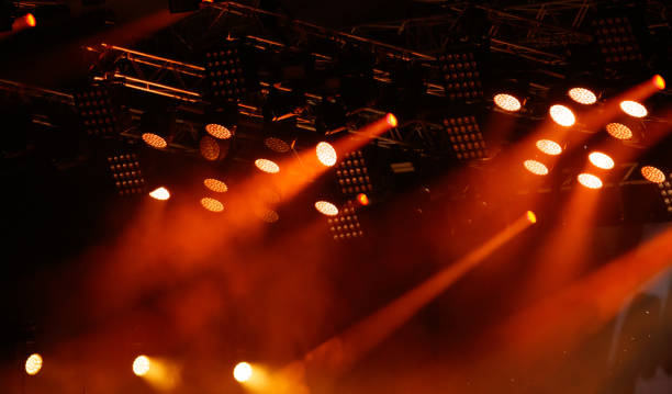 istock Red-orange color on stage at a concert 2173654589