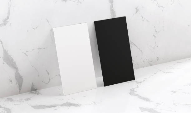 istock Blank business card mockup on white marble stone background 2173656383