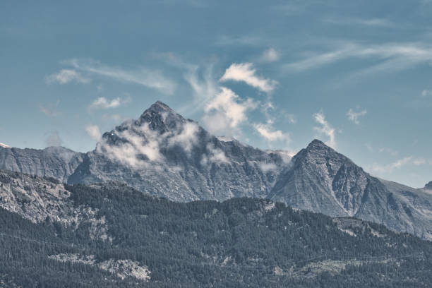 istock Hiking around a mountain lake 2173670897