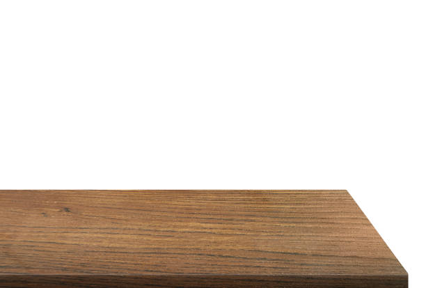 istock Side view of empty wooden table isolated on white background. 2173676174