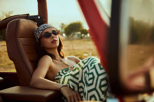 istock The beautiful woman in the jeep. 2173676721