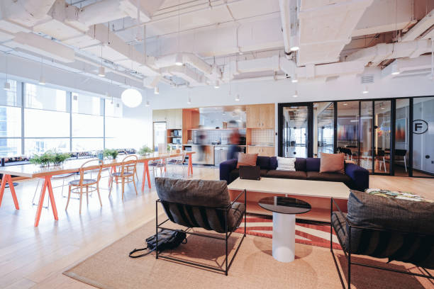 istock A vibrant and modern co-working space with a mix of comfortable lounge seating and work tables 2173679596