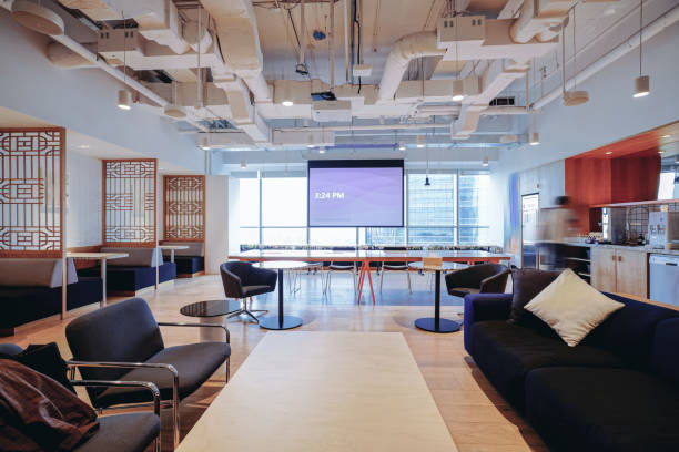 istock A vibrant and modern co-working space with a mix of comfortable lounge seating and work tables 2173679824