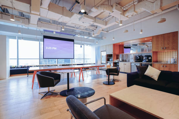 istock A vibrant and modern co-working space with a mix of comfortable lounge seating and work tables 2173679913