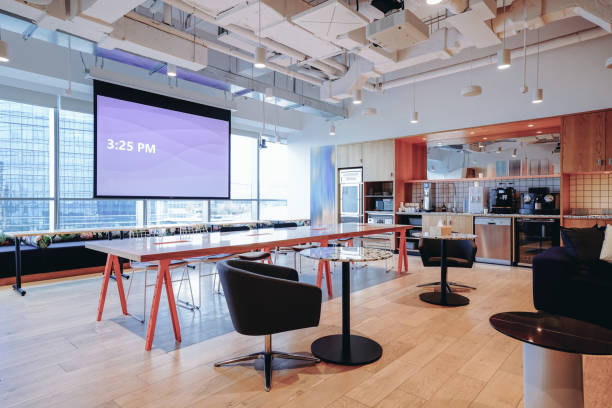 istock A vibrant and modern co-working space with a mix of comfortable lounge seating and work tables 2173679915