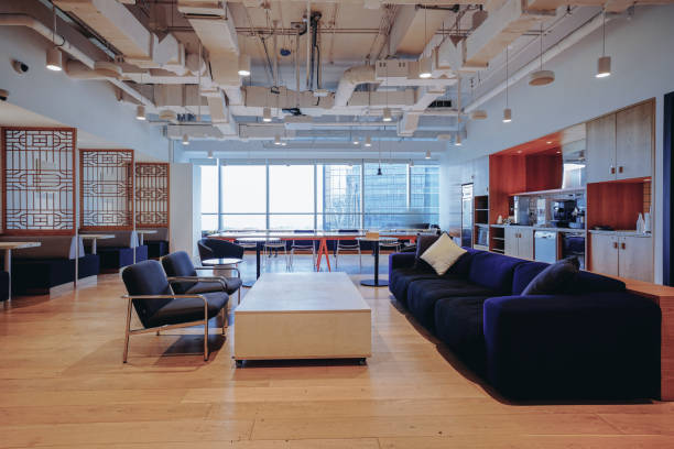 istock A vibrant and modern co-working space with a mix of comfortable lounge seating and work tables 2173680655
