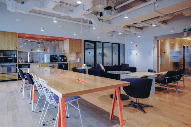 istock A vibrant and modern co-working space with a mix of comfortable lounge seating and work tables 2173680659