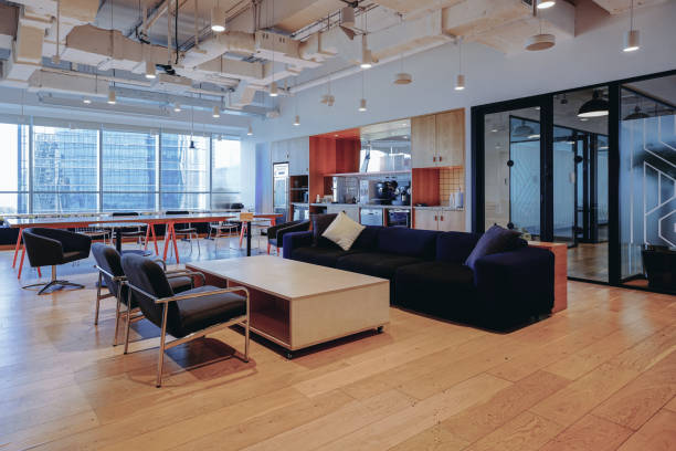 istock A vibrant and modern co-working space with a mix of comfortable lounge seating and work tables 2173680687