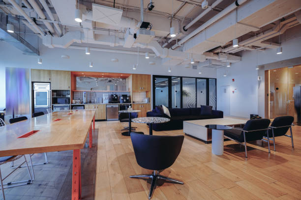 istock A vibrant and modern co-working space with a mix of comfortable lounge seating and work tables 2173680740