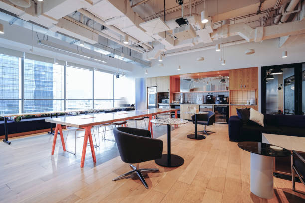istock A vibrant and modern co-working space with a mix of comfortable lounge seating and work tables 2173680810
