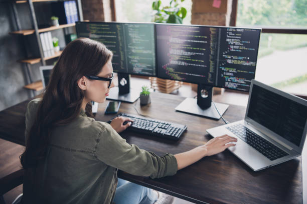 istock Photo of smart lady nerd working startup site program typing key words open pc upgrade reboot operating system indoor home workstation 2173683327