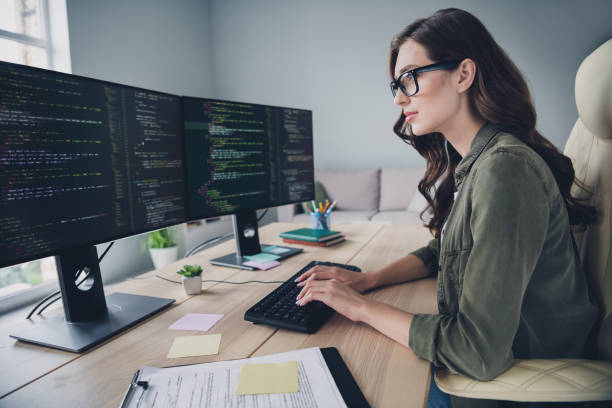 istock Profile side photo of clever charming lady professional hacker remove sms messages reboot pc server indoor room workstation 2173683361