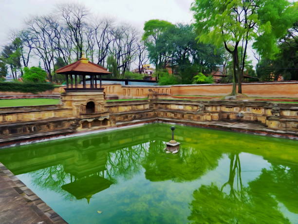 Royal Patan Palace Complex, or Patan Durbar Square . Tfacility for the Darbar. The architecture of the tank incorporates a meditation pavilion, a stepped terrace, two stone lions, a carved stone spout, and relief carvings dating to the 17th century.