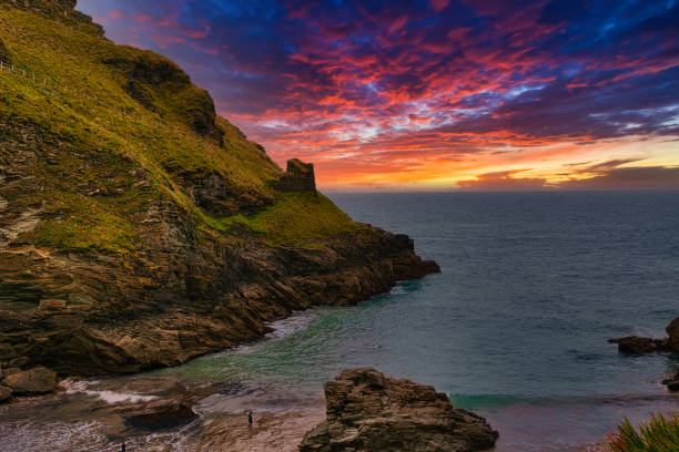 istock Vibrant Sunset Over Coastal Cliffs in Tintagel, Cornwall, UK 2173706406