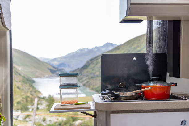 istock Campervan Kitchen with Scenic Mountain and Lake View 2173706915