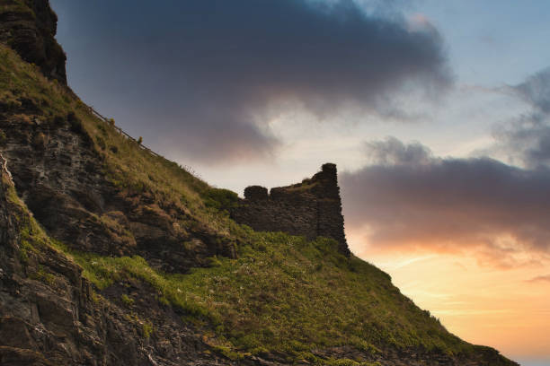 istock Sunset Over Ancient Cliff Ruins in Tintagel, Cornwall, UK 2173708994