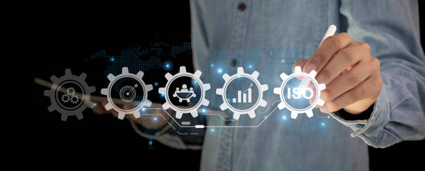 istock warranty business technology concept and ISO standards quality control, assurance Touching on screen with ISO and globe icons on smart background. ISO Standard certification. 2173714150